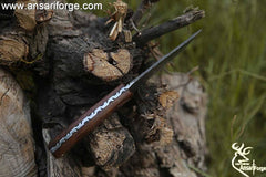 Handmade Damascus steel hunting deer skinning knife with leather sheath .