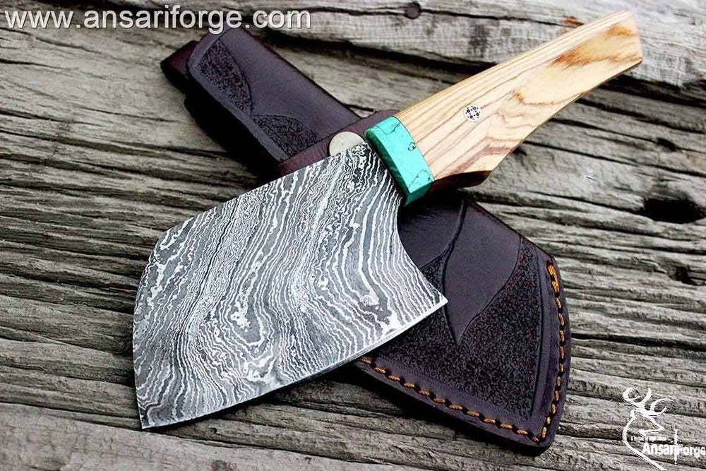 Custom handmade Damascus steel chef knife / Chopper , Cleaver Damascus steel 1095 & 15n20 hand forged twisted blade with 58 - 60 HRC hardness , Olive wood handle and comes with customized cowhide leather sheath .