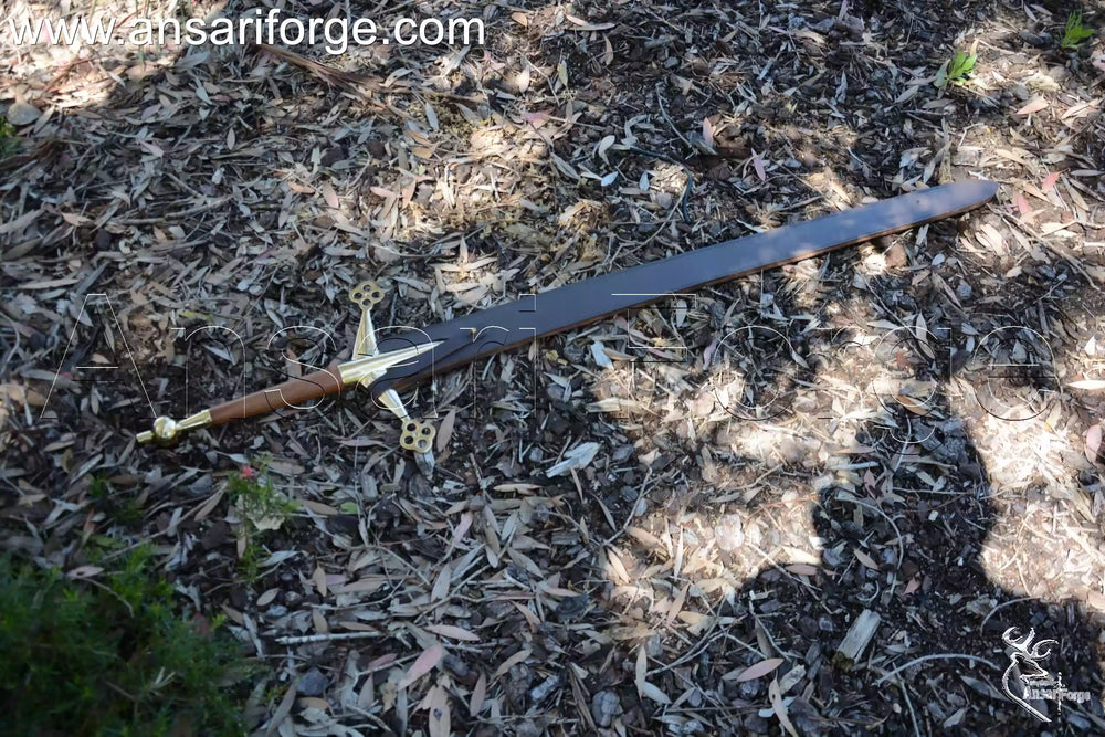 Scottish Claymore sword with rosewood handle and leather sheath.
