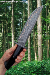 Detailed shot showing the full-tang construction and the textured black micarta handle of the Best fixed blade hunting knife.