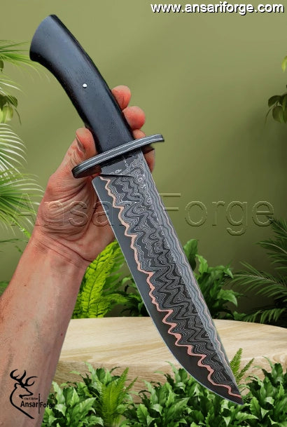 Copper Damascus steel knife hunting in a natural outdoor setting, showing the 60 HRC blade resting on a log.