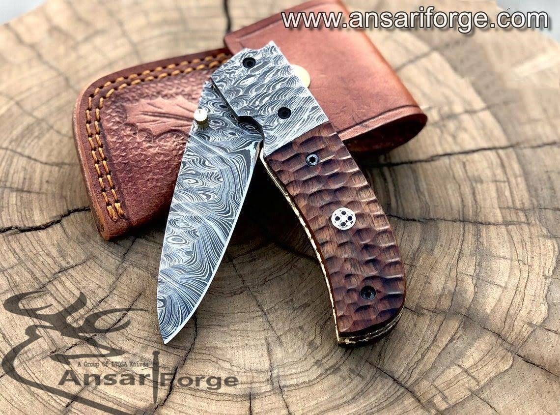 Hand-forged Damascus Steel Pocket Knife - Discover a masterpiece of craftsmanship. Featuring a razor-sharp blade, elegant rosewood handle, and durable construction. Perfect for outdoor adventures or everyday carry.