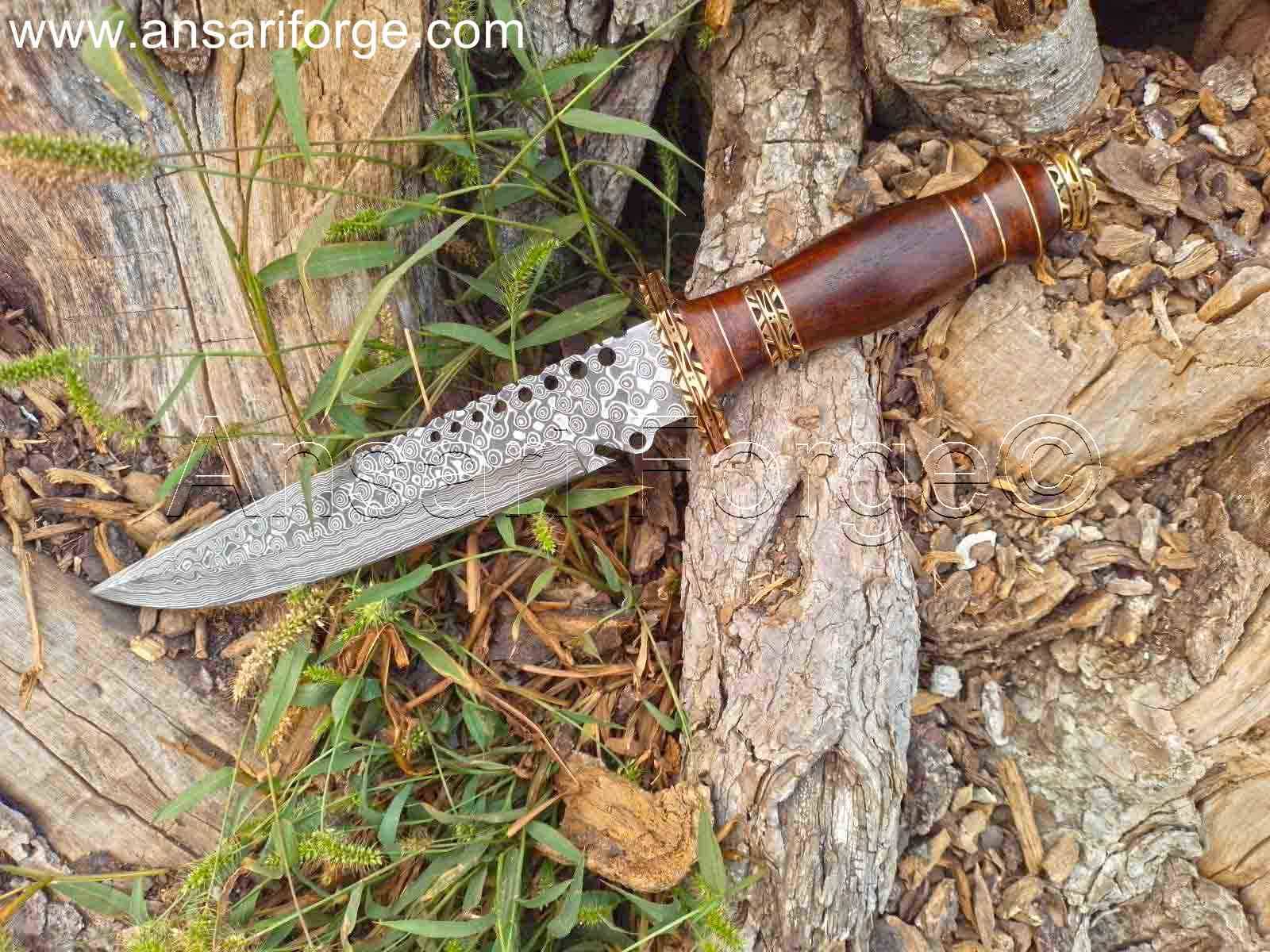Ergonomic rosewood handle of the custom Damascus hunting knife with a brass finger guard and pommel, highlighting its craftsmanship.