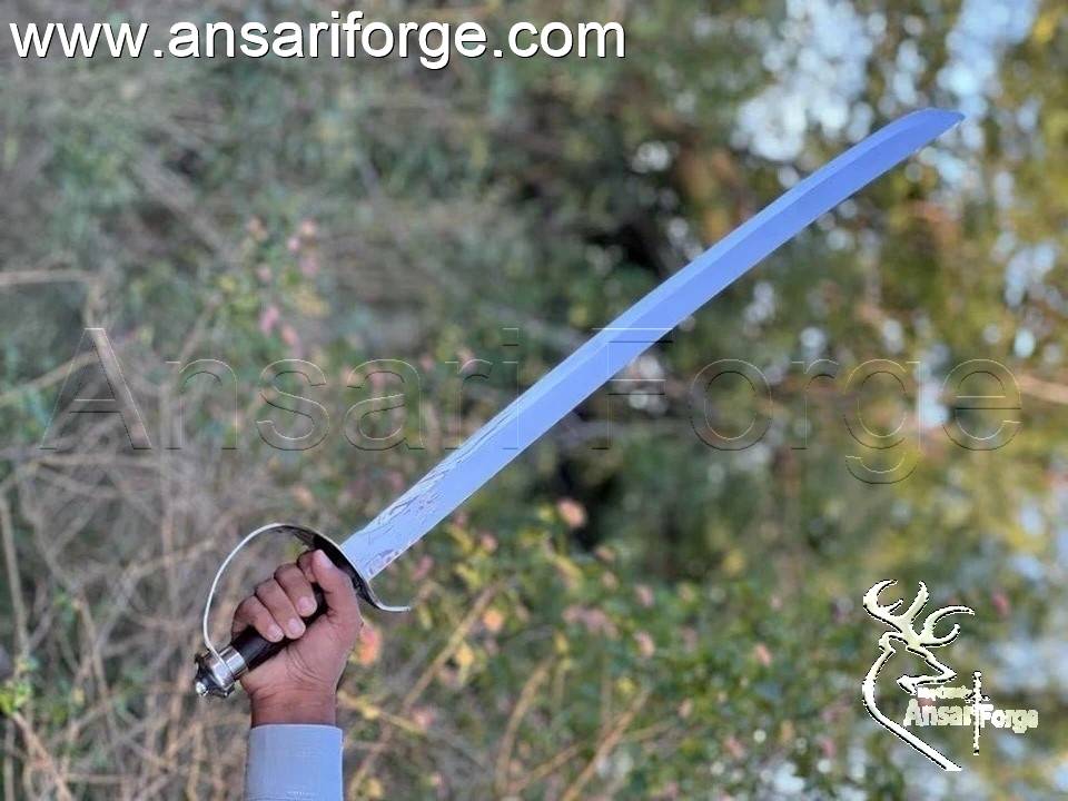 High carbon steel pirate sword close-up of blade.