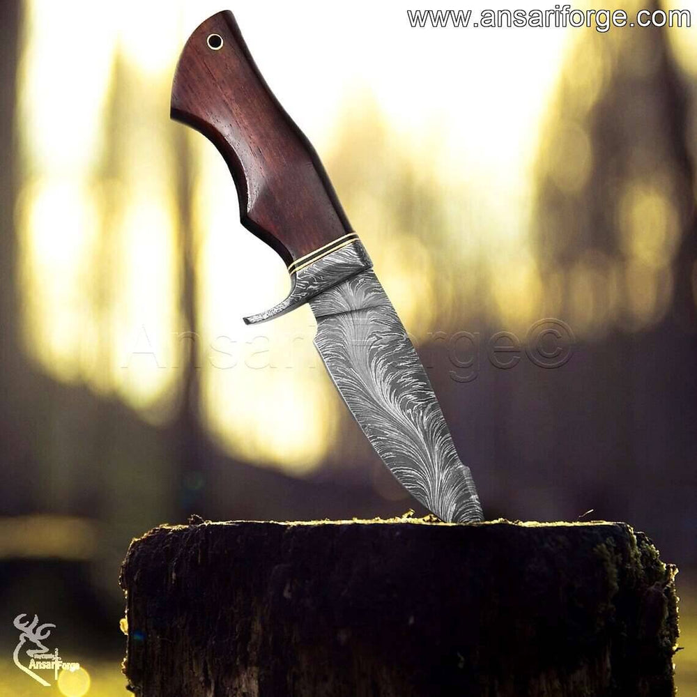 Premium Damascus Feather Knife featuring a versatile drop point blade, making it an excellent choice for hunting and bushcraft outdoor gear.