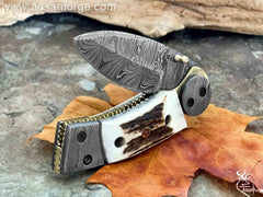 Custom made Damascus steel pocket knife with stag handle