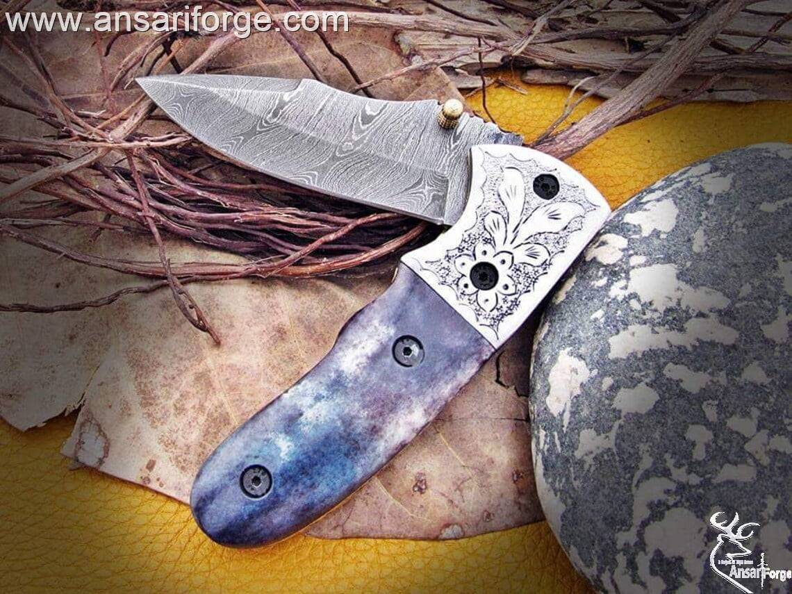 Durable Folding Pocket Knife for Hunting, Camping, and EDC.