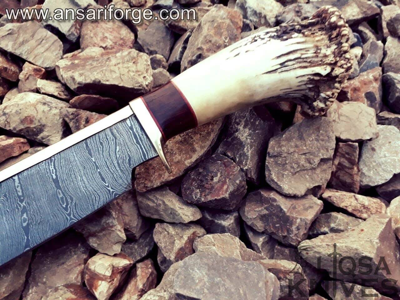 Stag antler handle of Damascus Bowie knife.