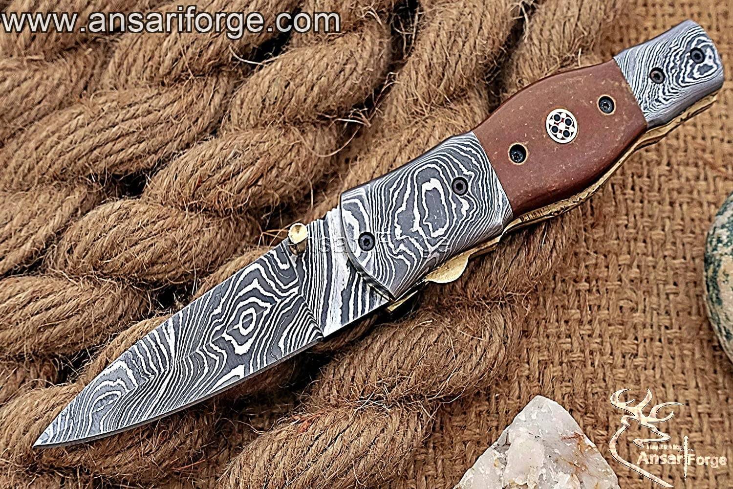 Damascus steel pocket knife with leather pouch