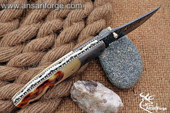Detailed view of the reliable liner lock mechanism on the Damascus Pocket Knife.
