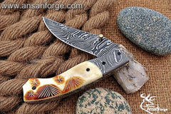 Intricate pattern of 1095 & 15n20 Damascus steel on the blade of the Damascus Pocket Knife.
