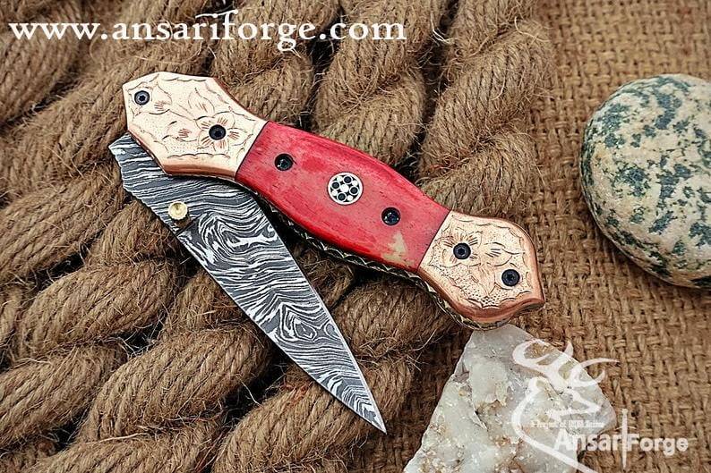 Damascus steel pocket knife Engraved bolsters