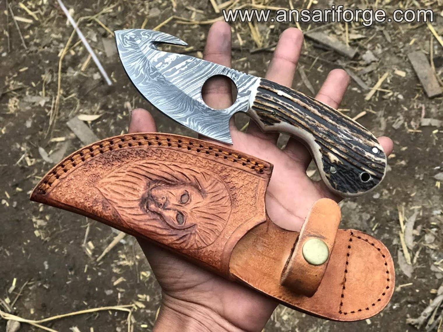 Damascus Gut Hook Knife with Stag Antler Handle & Leather sheath.