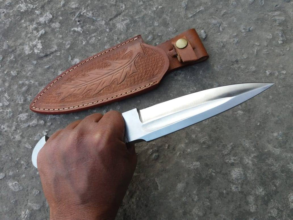 Close-up view of the 5-inch drop point blade of the Custom Made 5160 Steel Integral Hunting Knife, highlighting the fine edge and 6.0 mm thickness.