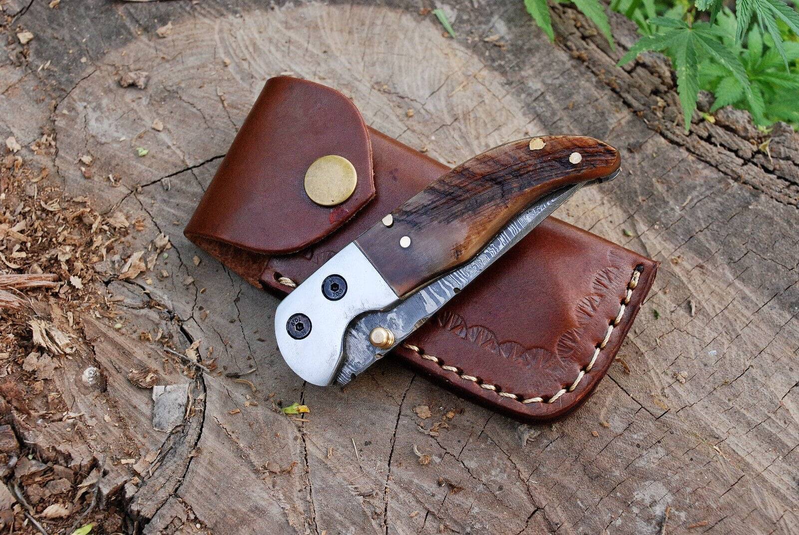 Closed view of Damascus pocket knife with 4.0 inch handle.