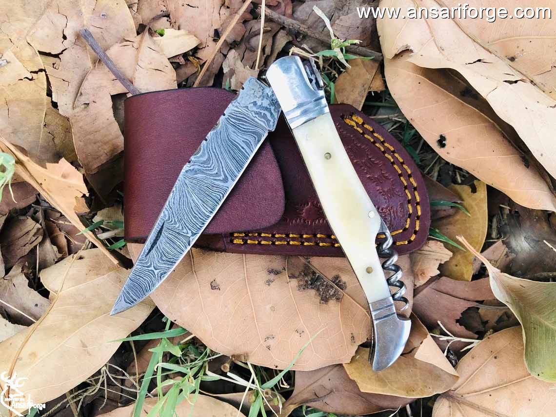 LAGUIOLE POCKET KNIFE WITH DAMASCUS BLADE BONE HANDLE AND STAINLESS STEEL BOLSTERS