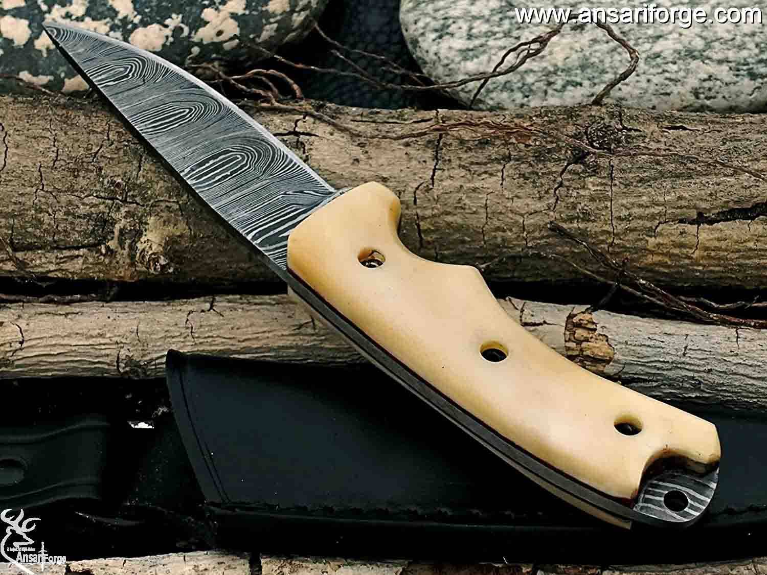 Camel bone handle Damascus knife.