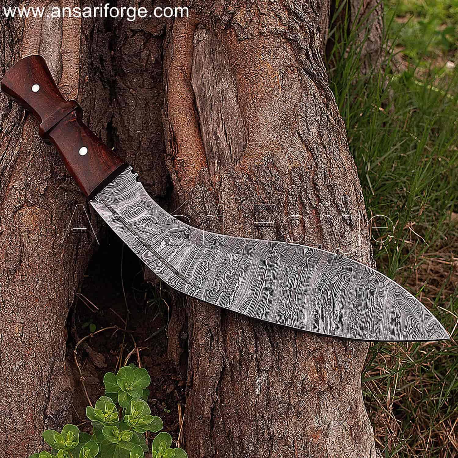 hand-forged Damascus steel kukri machete. The machete has a curved blade, rosewood handle, and leather sheath.