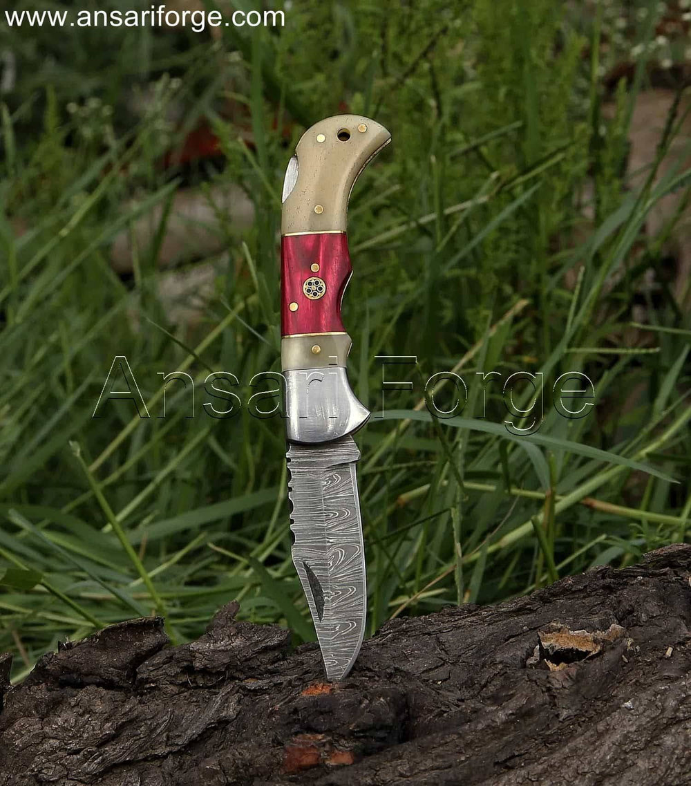 Handcrafted Damascus folding pocket knife with a unique twist pattern Damascus steel blade, camel bone and red pakkawood handle, and a brown cowhide leather sheath. This EDC knife is 7 inches long when opened.
