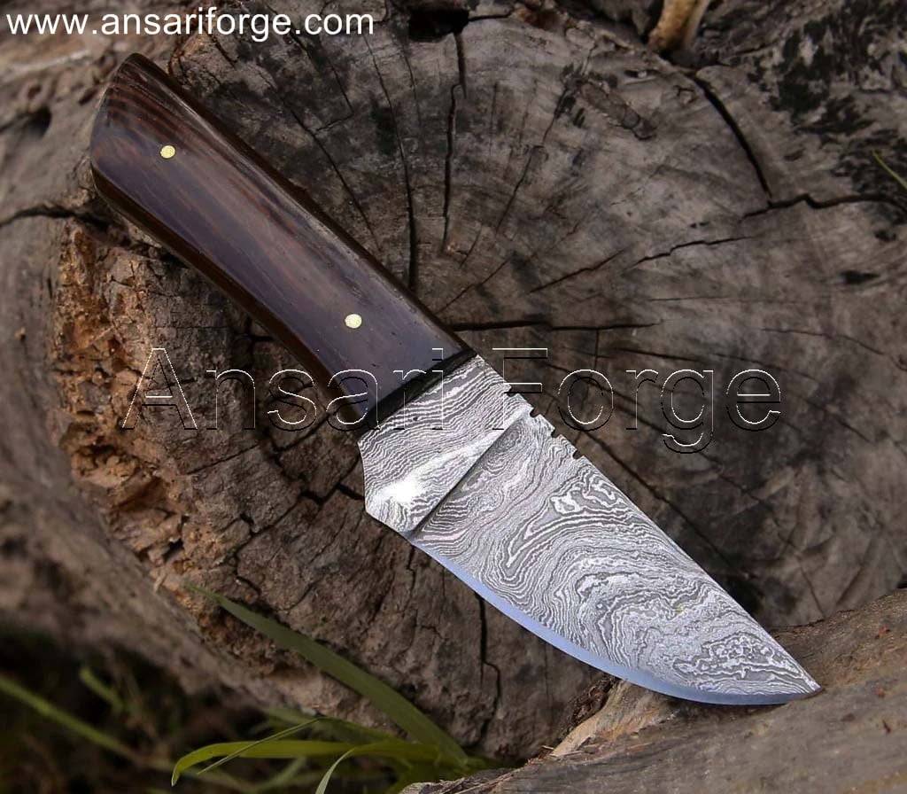Damascus knife for Skinning, Hunting with twist pattern, Wenge wood handle, and leather sheath.