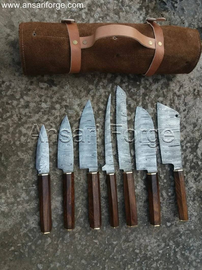 Octagonal Japanese "Wa" style rosewood handles on Damascus steel knives, emphasizing comfort and control.