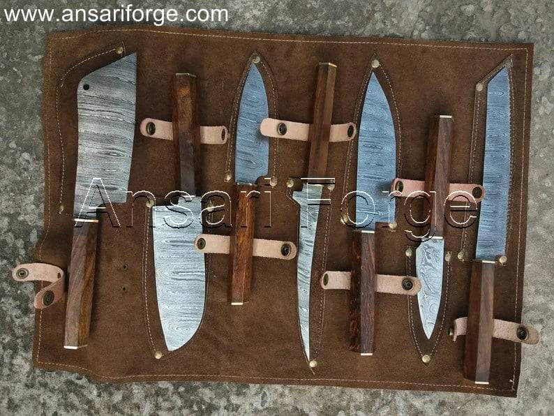 High-quality Damascus knife set displayed in a cowhide leather roll bag. Includes a chef knife, slicing knife, bread knife, santoku knife, utility knife, paring knife, and cleaver.