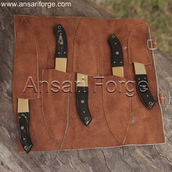 Pro Damascus Chef Knife Set featuring five beautifully crafted knives with Damascus steel blades and ergonomic buffalo horn handles, displayed in a luxurious leather roll bag.