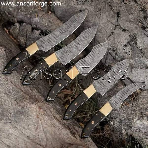 Pro Damascus Chef Knife Set featuring five beautifully crafted knives with Damascus steel blades and ergonomic buffalo horn handles, displayed in a luxurious leather roll bag.