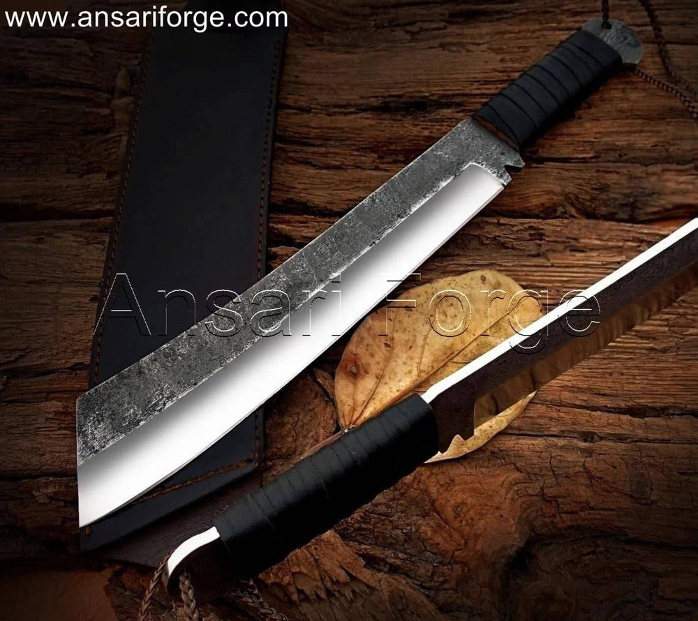 Hand-forged survival machete knife with a leather-wrapped handle and genuine cowhide leather sheath.