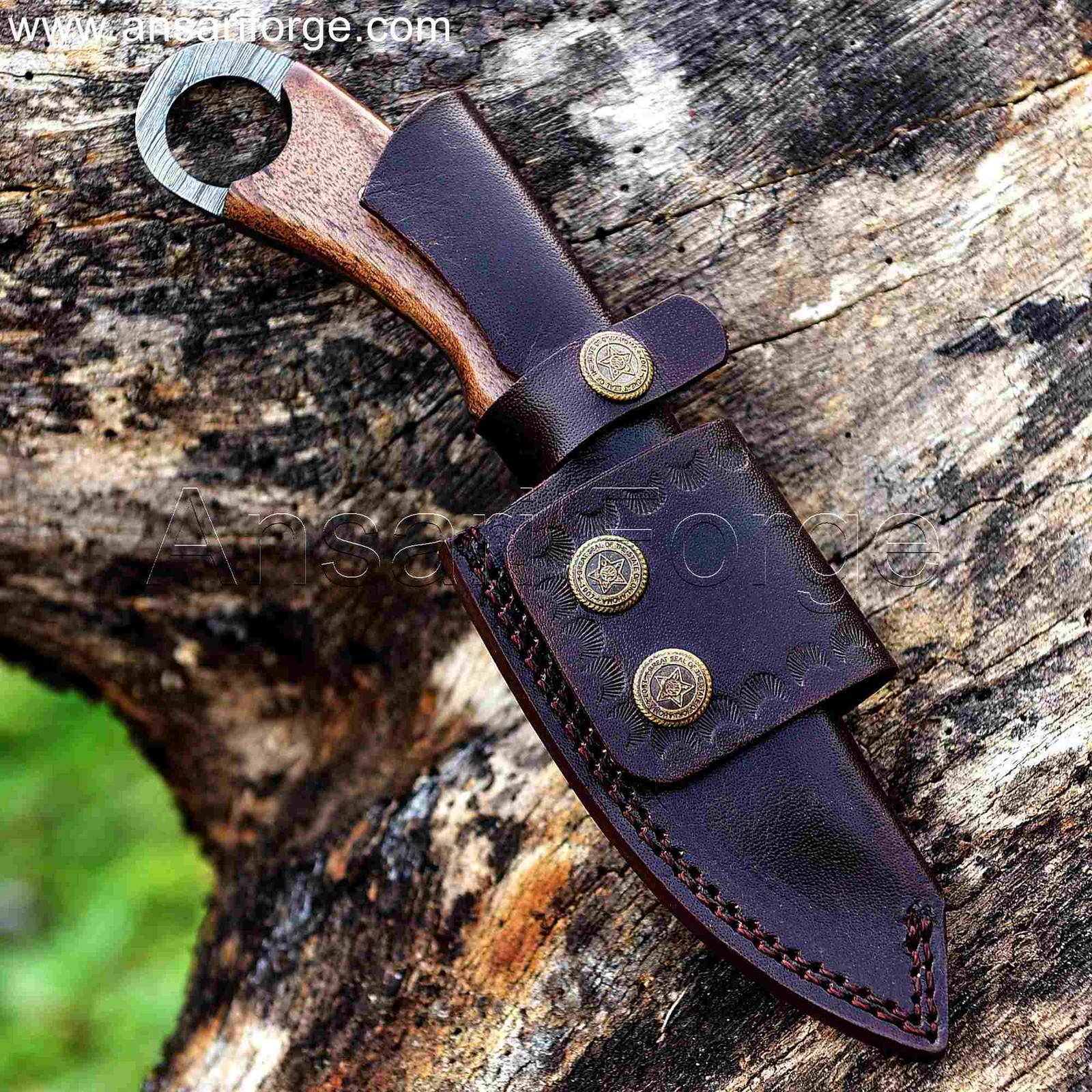 The Claw Damascus Backpacker Knife. Hand-forged Damascus steel blade with twist pattern, walnut wood handle, leather sheath. For hunting, camping, hiking.