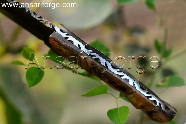 File work on spine of full tang Damascus hunting knife