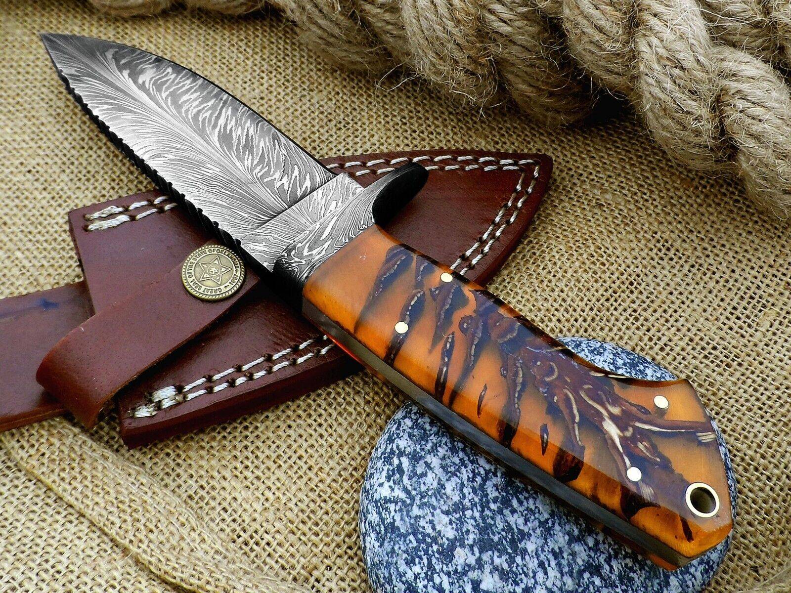 Handcrafted Feather Damascus Steel Hunting Knife with intricate 512-layer blade, pine cone handle, and leather sheath. Full tang fixed blade Bowie knife, 9.5 inches overall length, ideal for camping, survival, and hunting tasks.