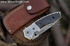 Custom Damascus Pocket Knife with raindrop pattern blade, buffalo horn handle, and cowhide leather sheath