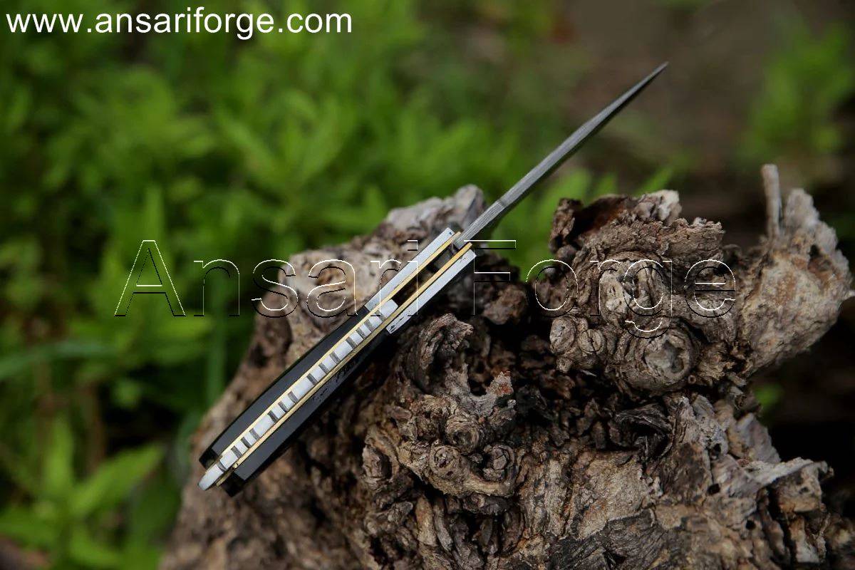 Beautiful file work on line lock custom Damascus folding pocket knife.