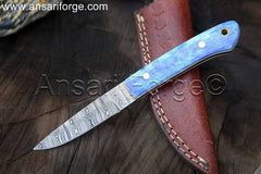 Custom Damascus Bird And Trout Knife Experience the beauty and functionality of this handcrafted Damascus knife, perfect for small game hunting and fishing. Featuring a stunning twist pattern, full tang construction, and a comfortable camel bone handle, this knife is a must-have for any outdoor enthusiast.
