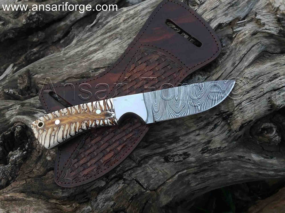 Custom cowboy knife for sale with Damascus steel and pine cone handle & pancake leather sheath.