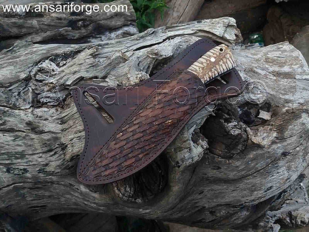 The Range Rider cowboy knife with a genuine cowhide leather cross draw carry pancake sheath.