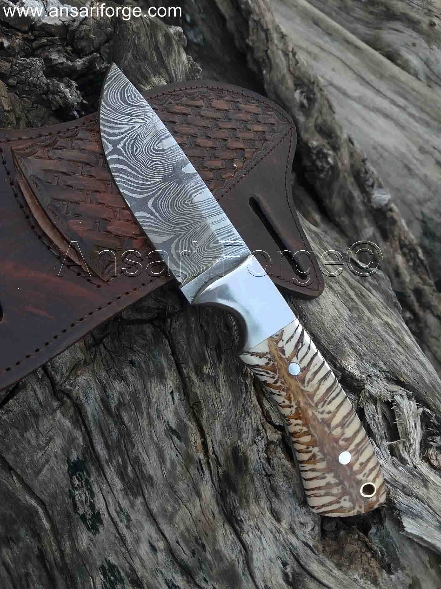 Full tang drop point blade of the Range Rider Cowboy Knife.
