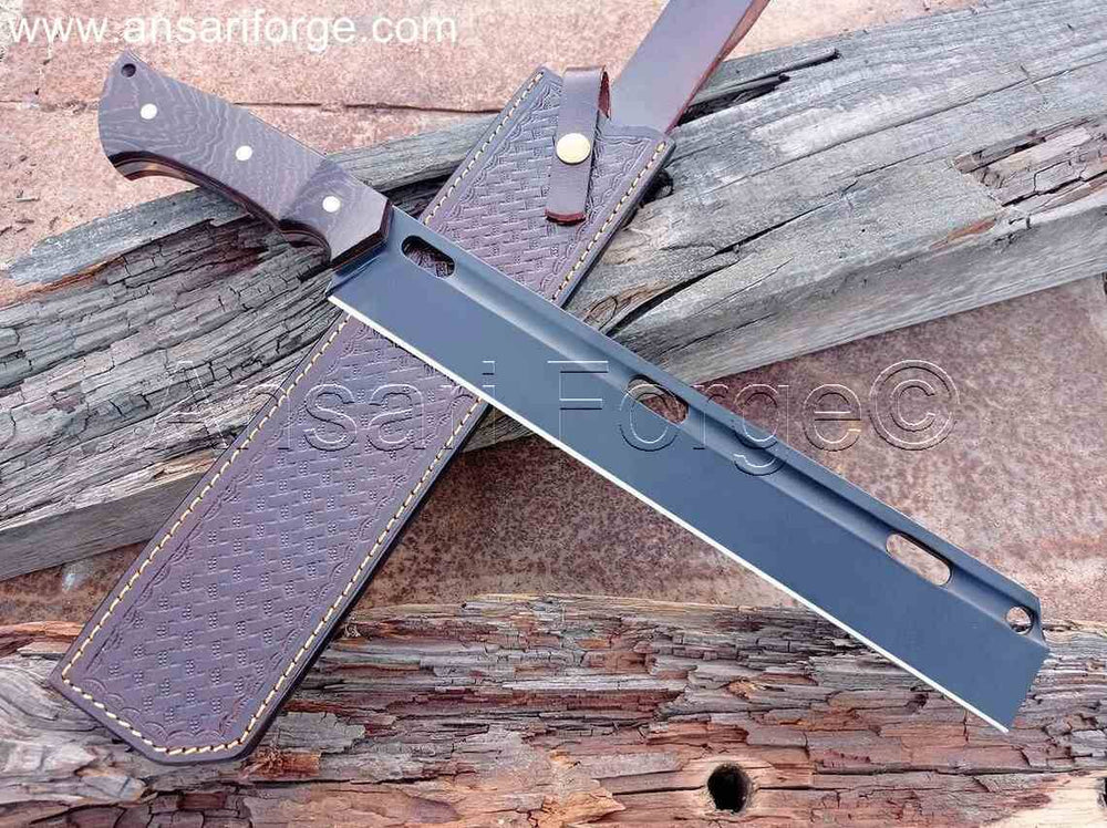 Hand-forged The Bushcutter Machete Knife by Ansari Forge with 13-inch black-coated steel blade, leather sheath and wood handle.