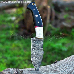 Buffalo horn handle with camel bone bolsters of Damascus knife for hunting.