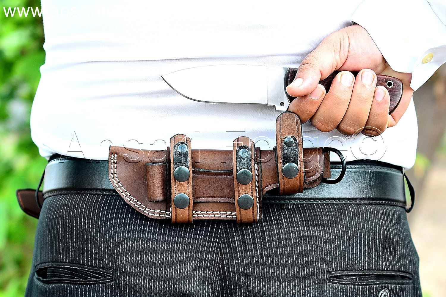 Handmade hunting knife with horizontal carry sheath.