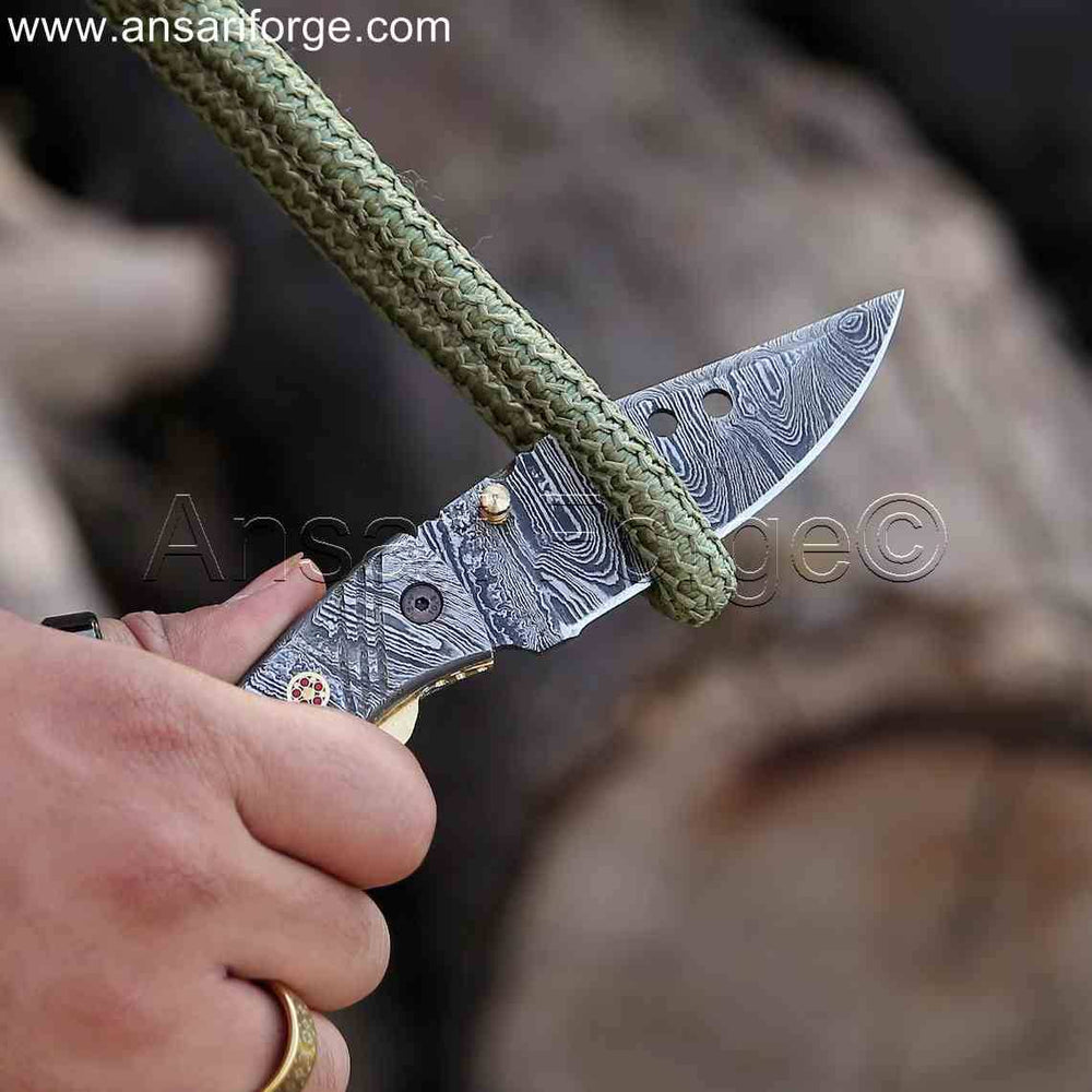 Damascus Pocket Knife with handmade Damascus steel blade and twist pattern.