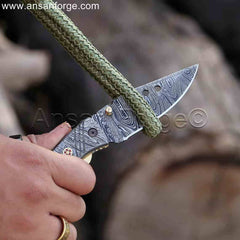 Damascus Pocket Knife with handmade Damascus steel blade and twist pattern.