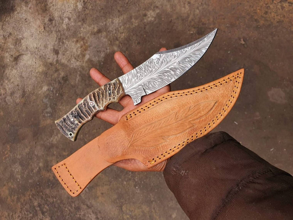 Blue Sheep Custom Handmade Damascus Steel Feather Pattern Hunting Knife with Himalayan sheep horn handle and leather sheath.