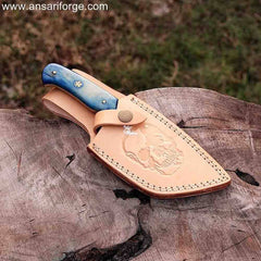 Honoo Damascus steel tanto knife securely stored in brown leather sheath.