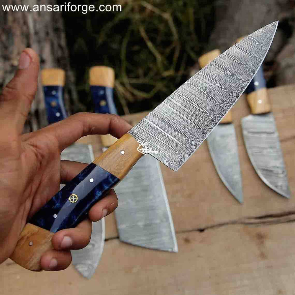Hand-forged Damascus Chef Knife Set with 5 beautifully crafted knives in a protective roll bag.