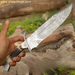 Hand-forged Damascus Bowie Knife with a beautiful stag antler handle and genuine leather sheath.