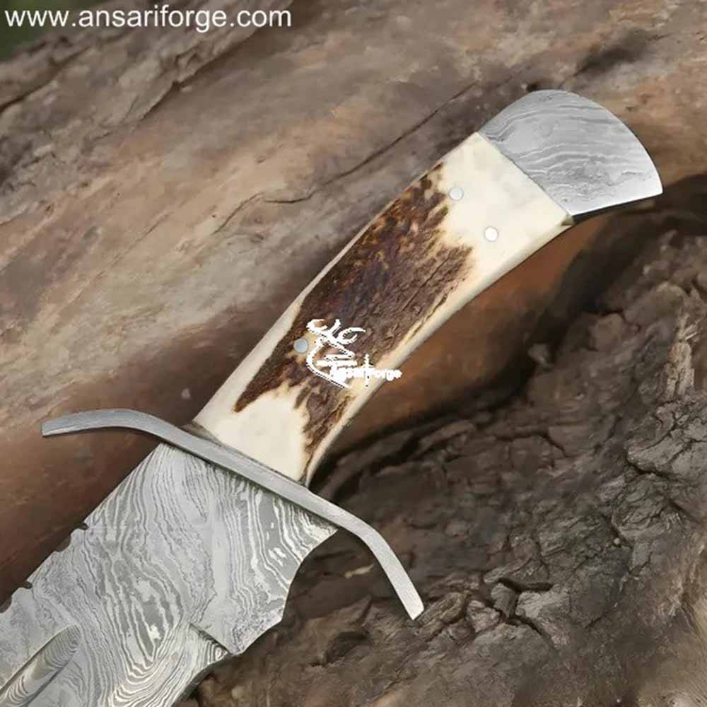 Hand-forged Damascus Bowie Knife with a beautiful stag antler handle and genuine leather sheath.