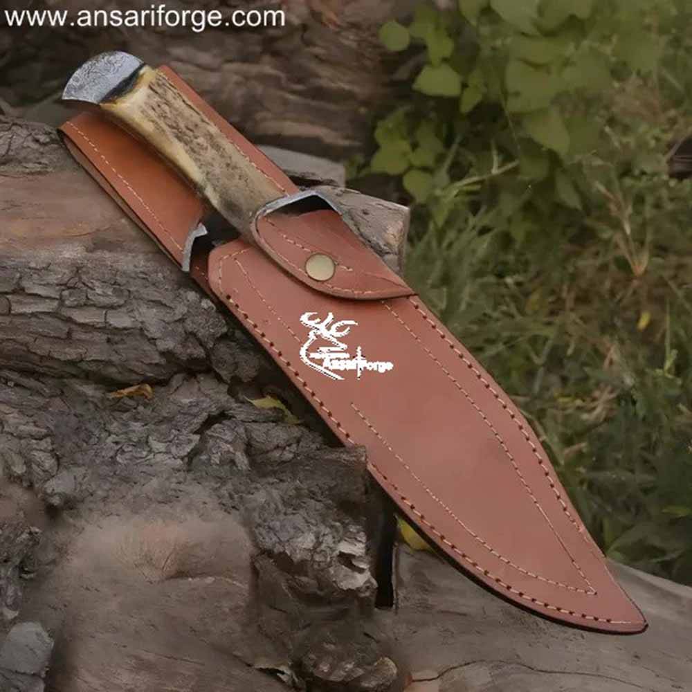 Hand-forged Damascus Bowie Knife with a beautiful stag antler handle and genuine leather sheath.