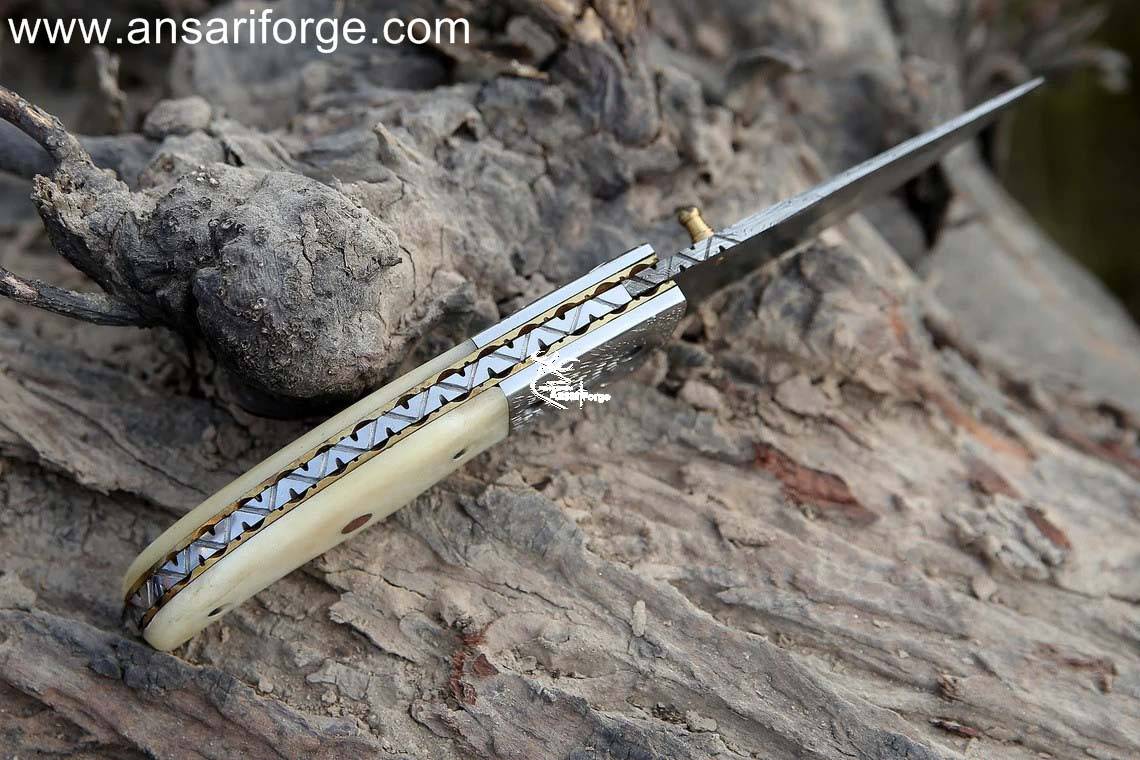 Sharp Eagle Damascus Pocket Knife Blade: Sharply forged 1095 & 15N20 Damascus steel with distinct layered pattern.